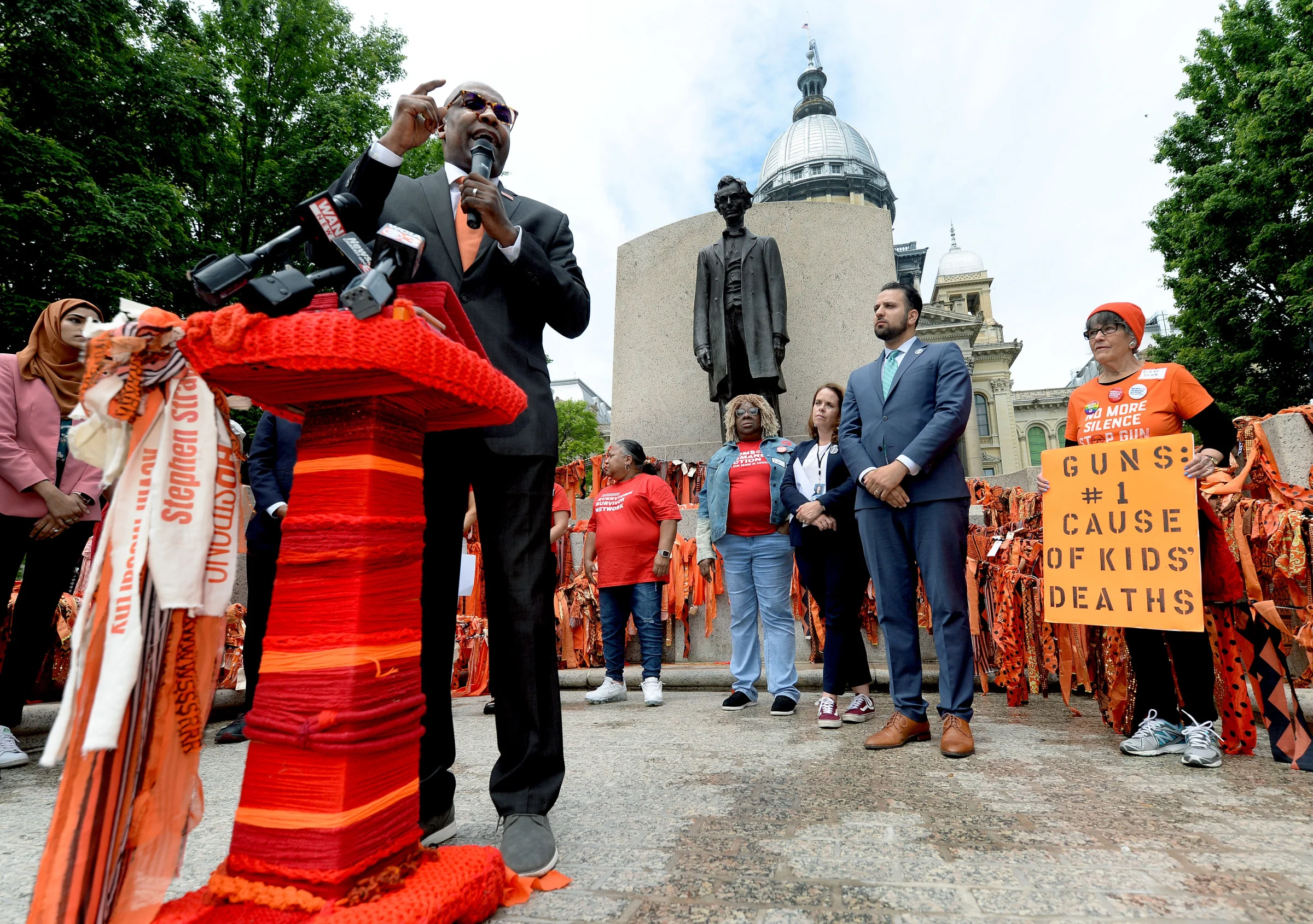 Illinois Attorney General Kwame Raoul speaks during a gun violence prevention rally in front of the state Capitol Tuesday, May 16, 2023.