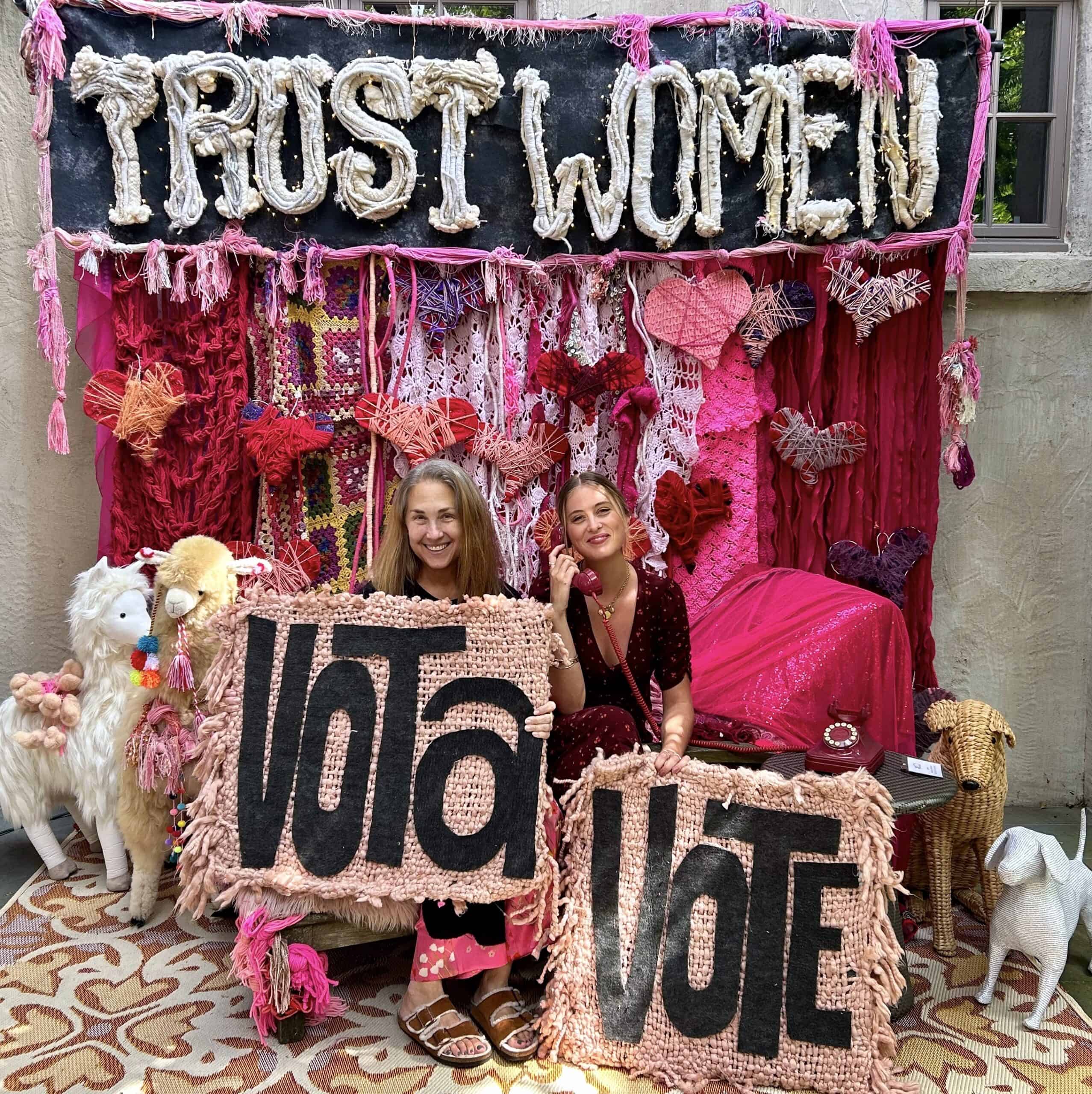 Pink yarn selfie station at Mi Vecino!